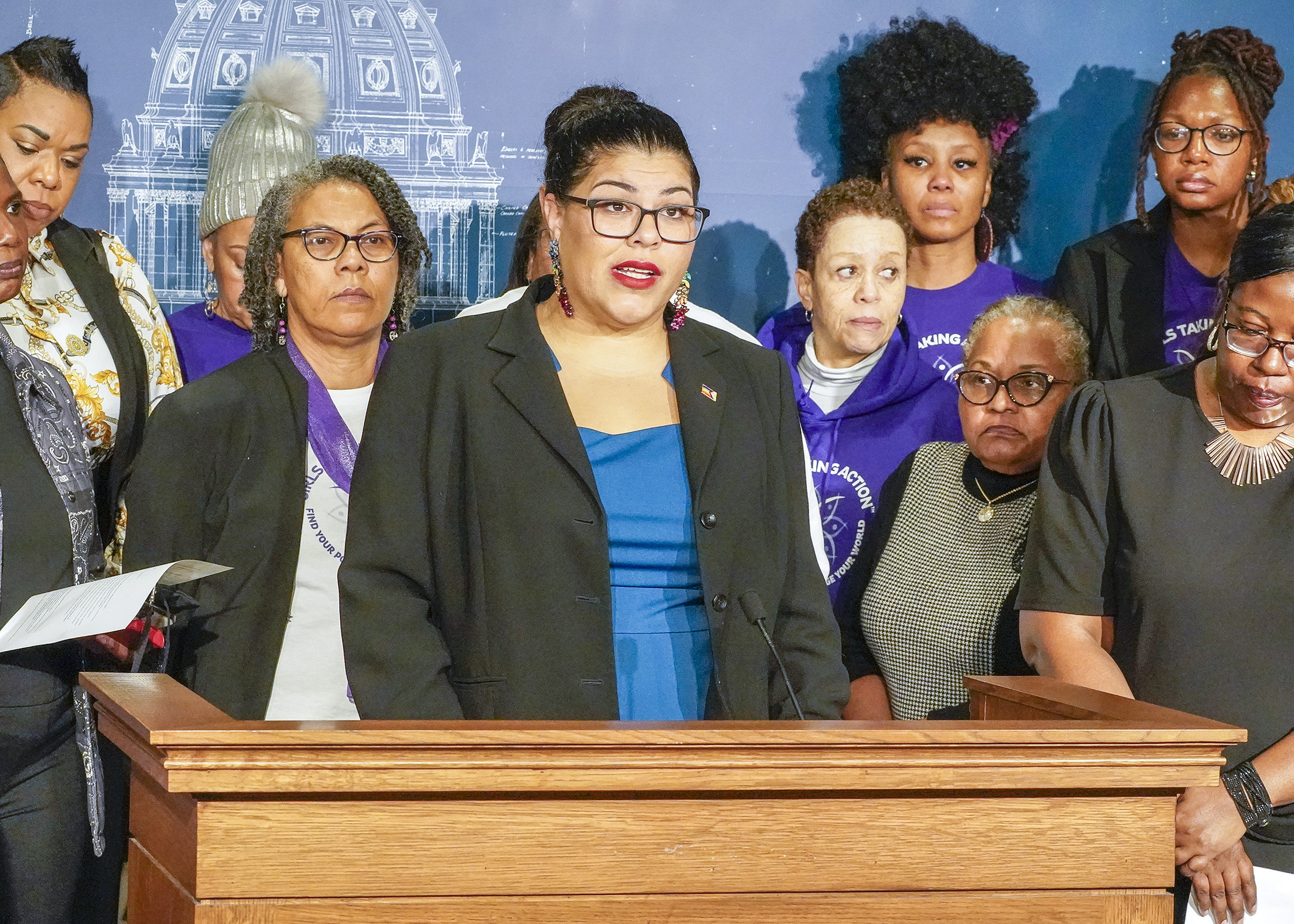 Rep. Athena Hollins takes questions about HF16, a bill that would prohibit conversion therapy with children or vulnerable adults, ahead of the Feb. 20 House Floor session. (Photo by Andrew VonBank)